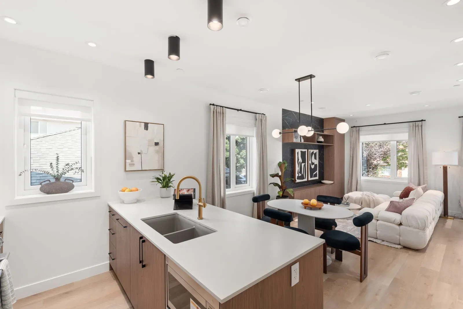 Quintet | 2240 E 40th Ave Fiveplex: kitchen island and open living space