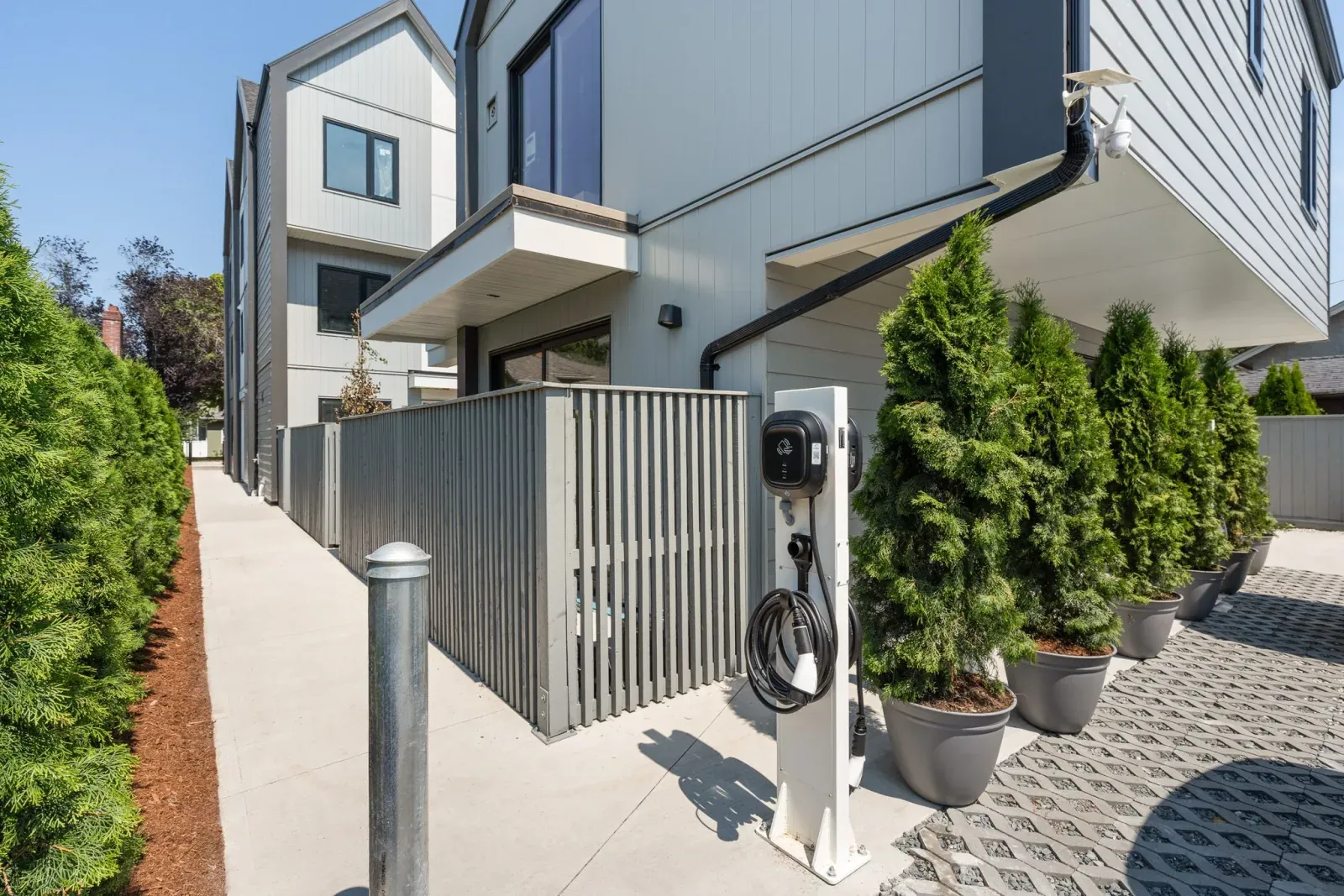 Quintet | 2240 E 40th Ave Fiveplex: EV charging station and side yard